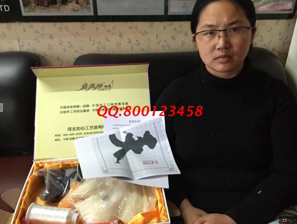 福建廈門小學教師陳女士業(yè)余時間兼職做手工活之家珠繡增加收入(圖1)