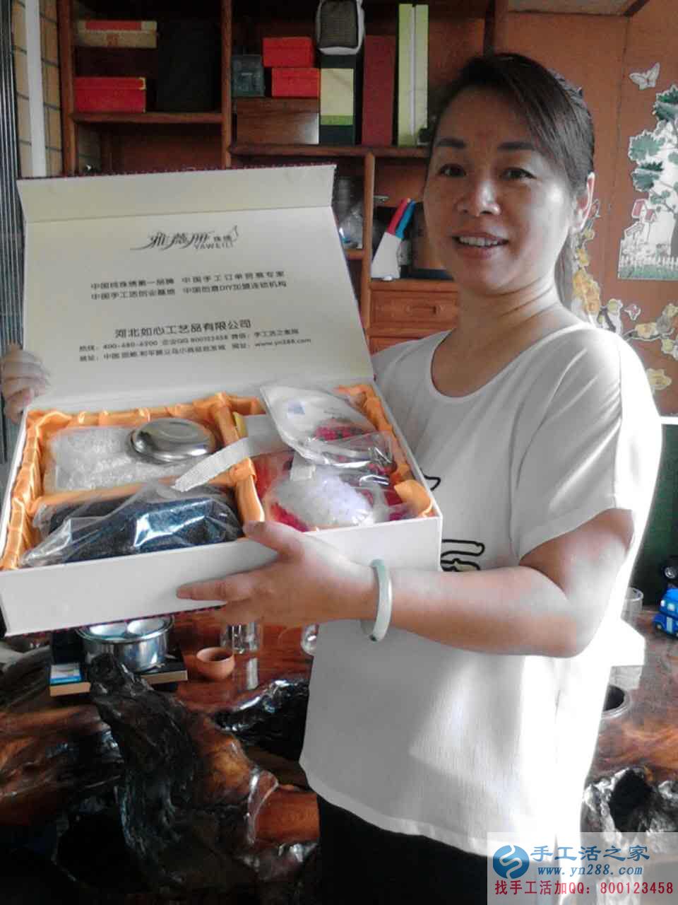 廣西百色市覃女士找到可以在家做的手工活，不交押金不用錢(qián)