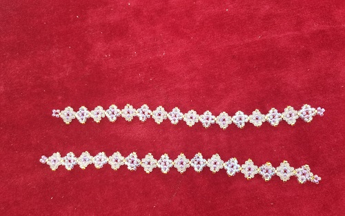 圖為串珠米珠繡純手工產(chǎn)品剪影 圖為串珠米珠繡純手工產(chǎn)品剪影