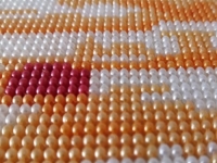 寒風(fēng)呼嘯的小雪時(shí)節(jié)，能在家做串珠繡手工賺錢很幸福